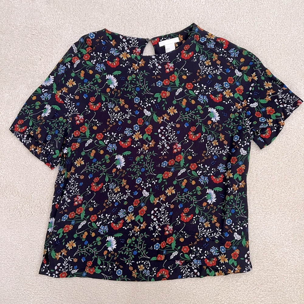 Navy blue, floral patterned short sleeve blouse